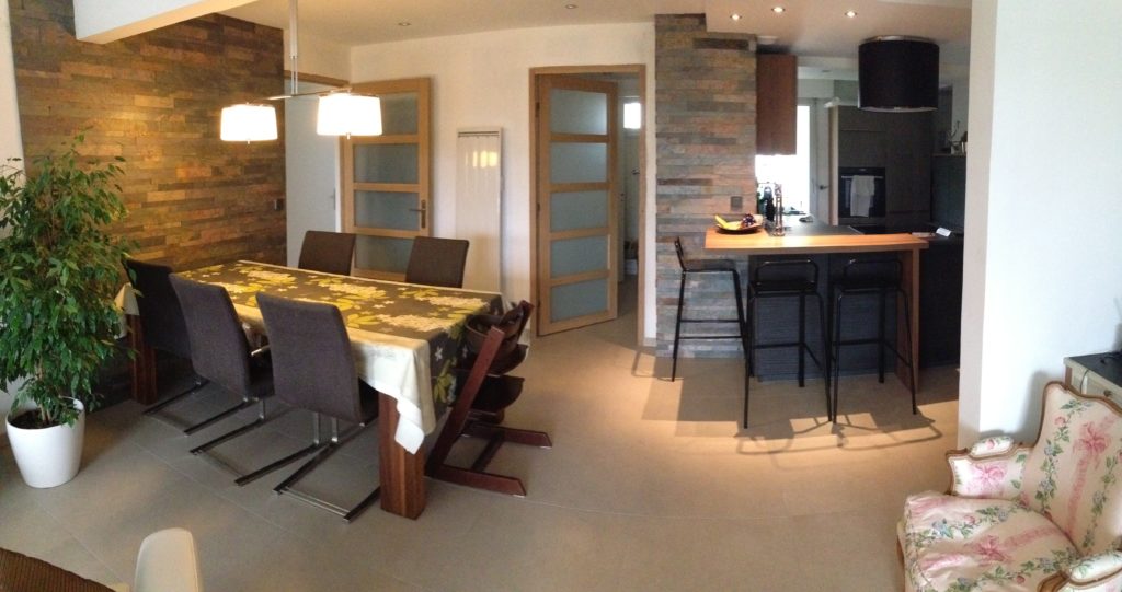 Aménagement complet du séjour et de la salle à manger dans un appartement parisien.