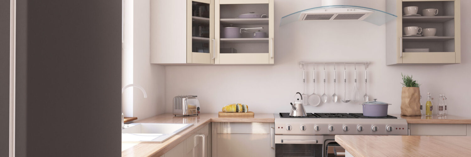 Photographie d'une cuisine intérieure. Cette cuisine est grande toute équipée et moderne avec des coloris claires